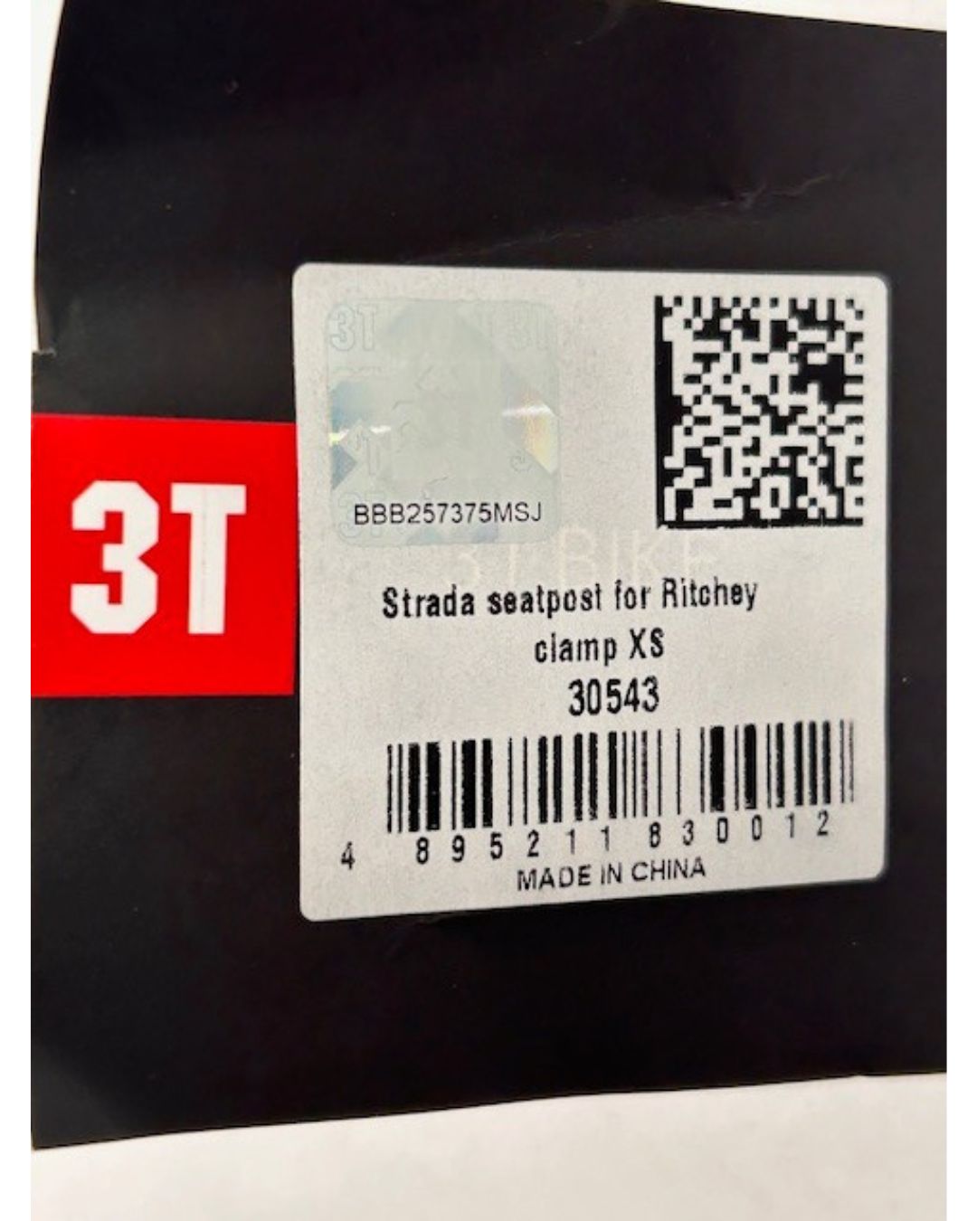 T Strada/Integrale XS glossy black carbon fiber seatpost, 220 mm length, OEM part 30543, clamp hardware not included