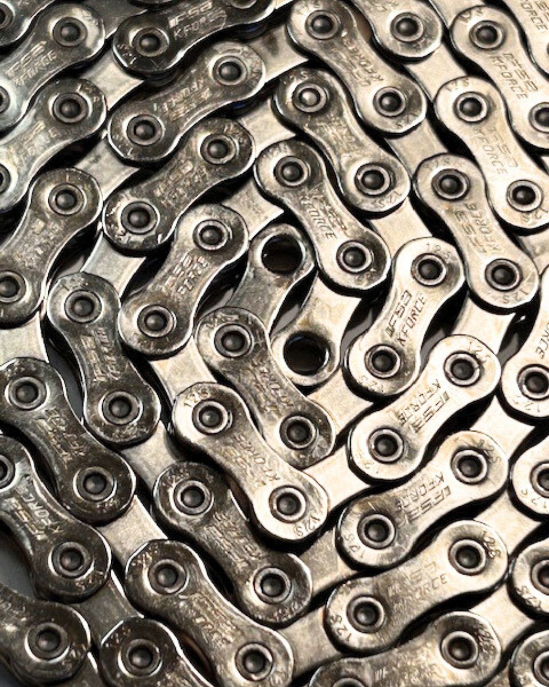 4-pack FSA K-Force Light 12-speed MTB chains, 116 links each, with DriveLink connector